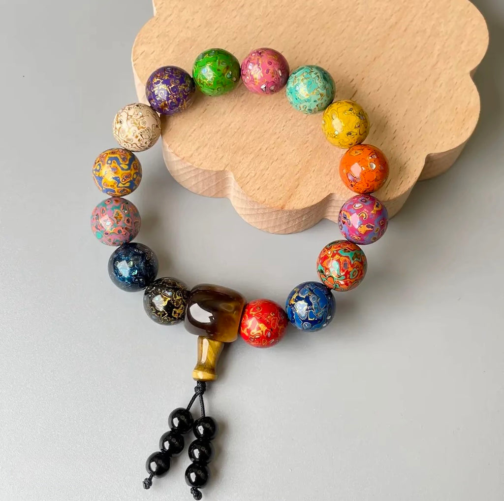Threaded Rhinoceros Hide Lacquer Bead Rainbow Bracelet
