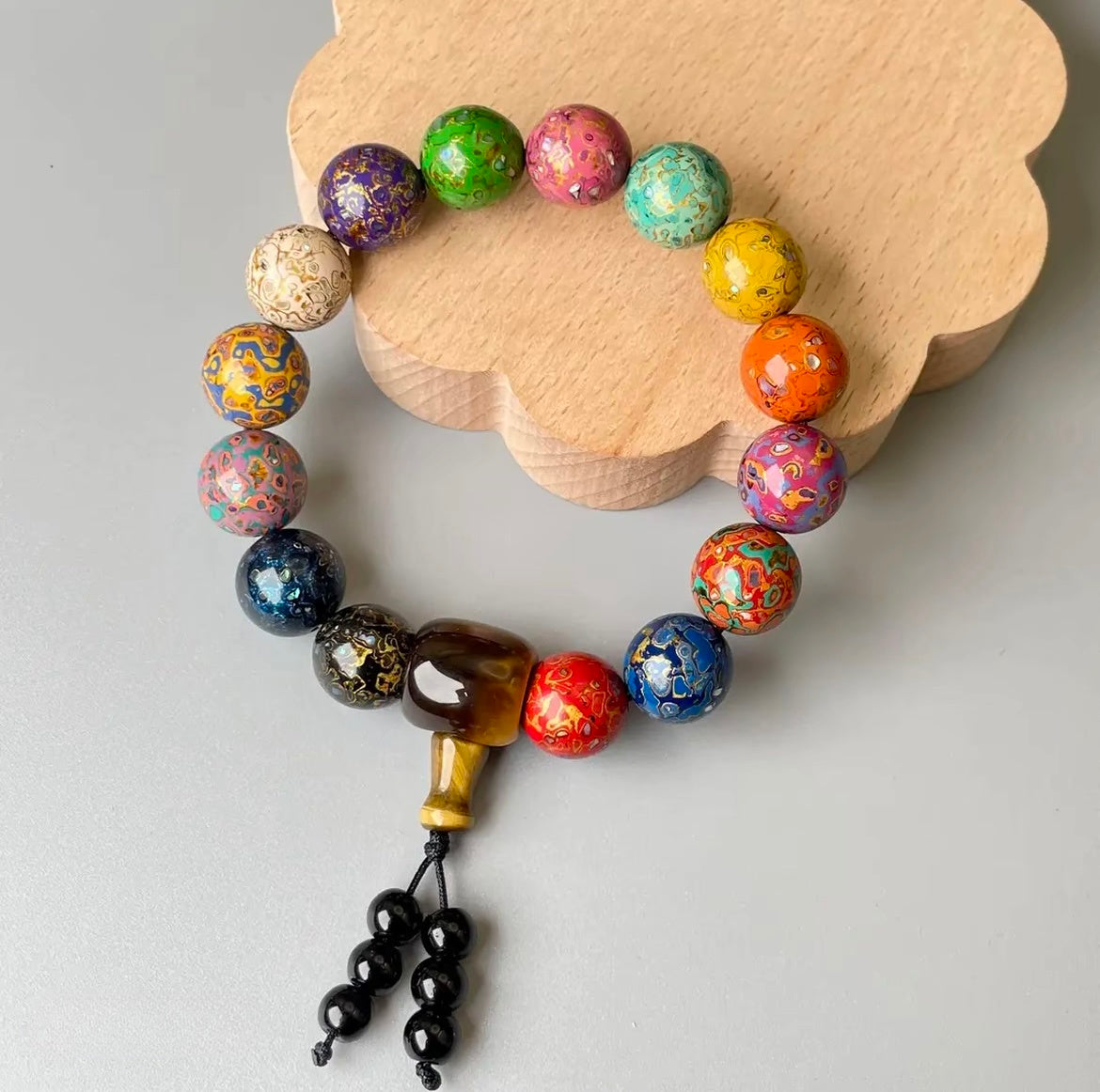 Threaded Rhinoceros Hide Lacquer Bead Rainbow Bracelet