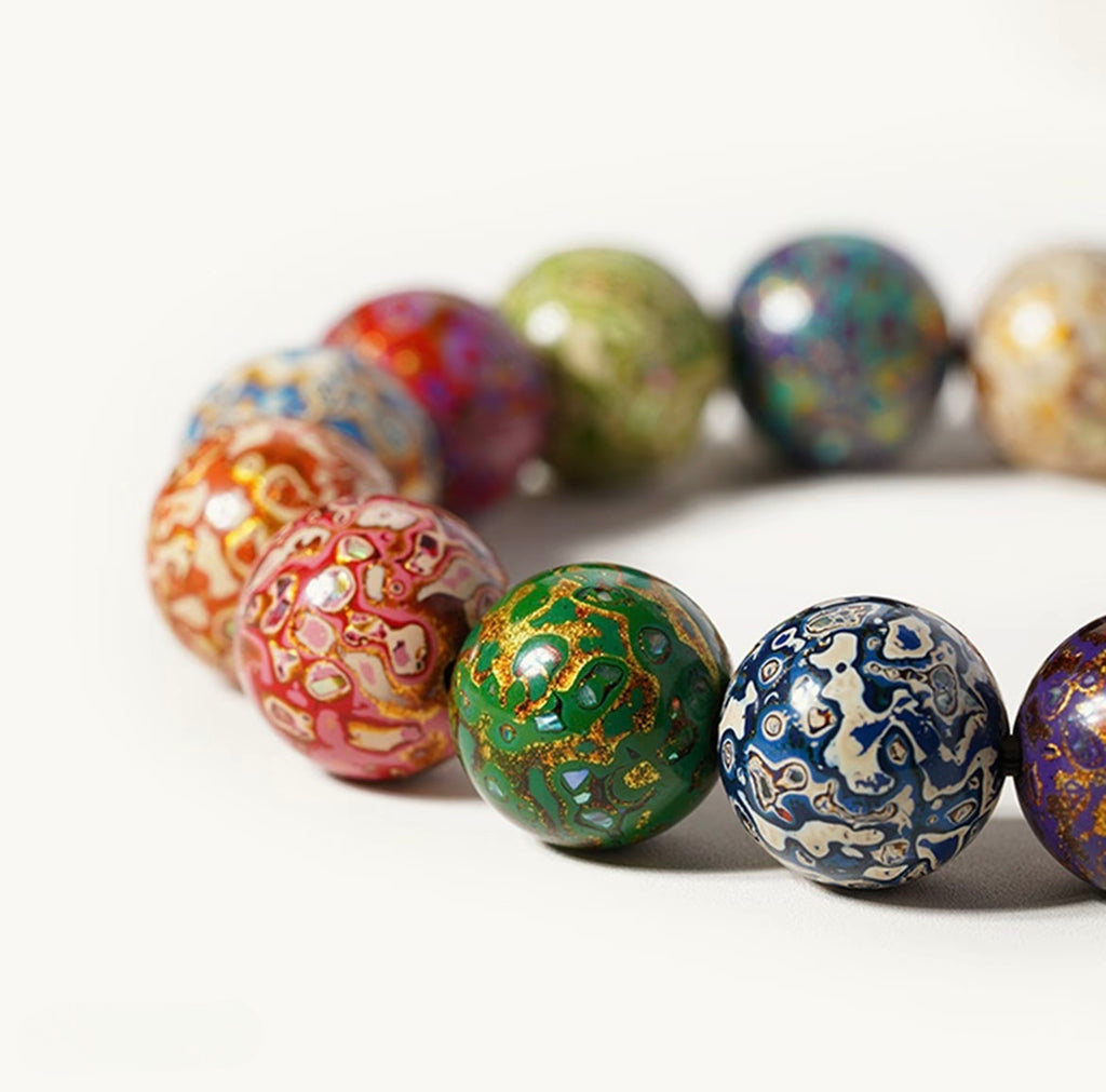 Threaded Rhinoceros Hide Lacquer Bead Rainbow Bracelet