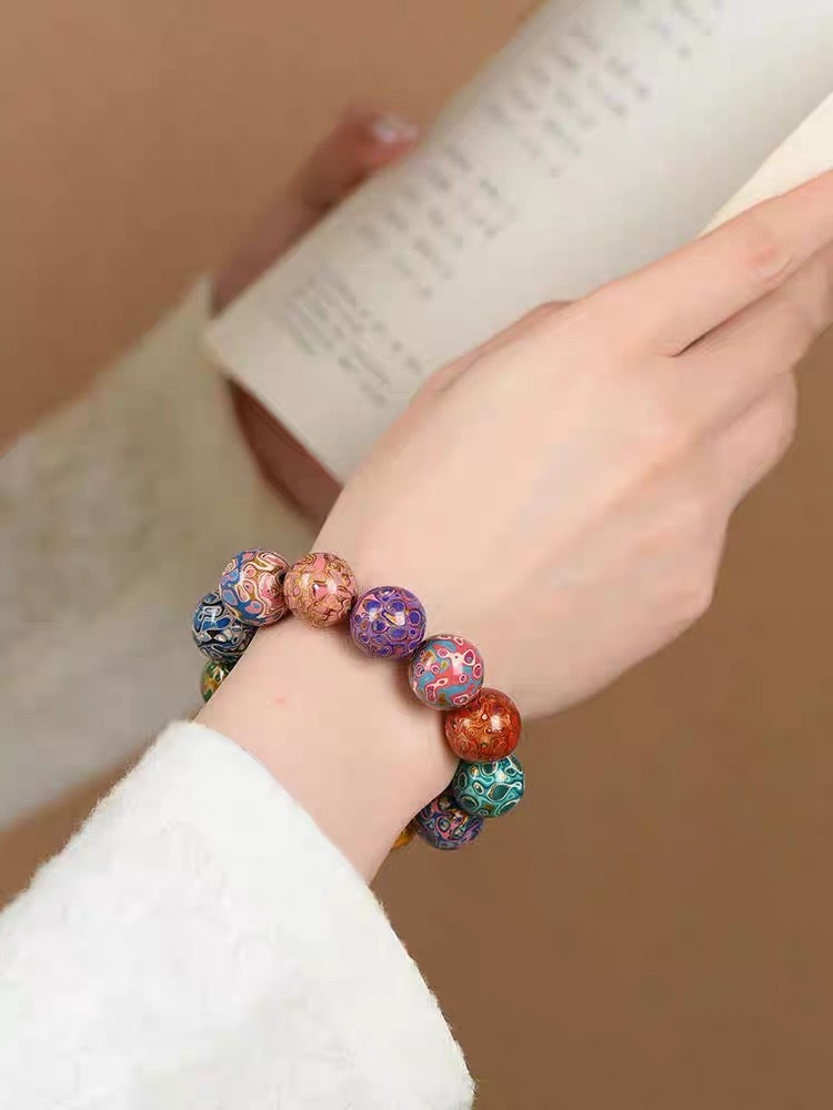 Threaded Rhinoceros Hide Lacquer Bead Rainbow Bracelet